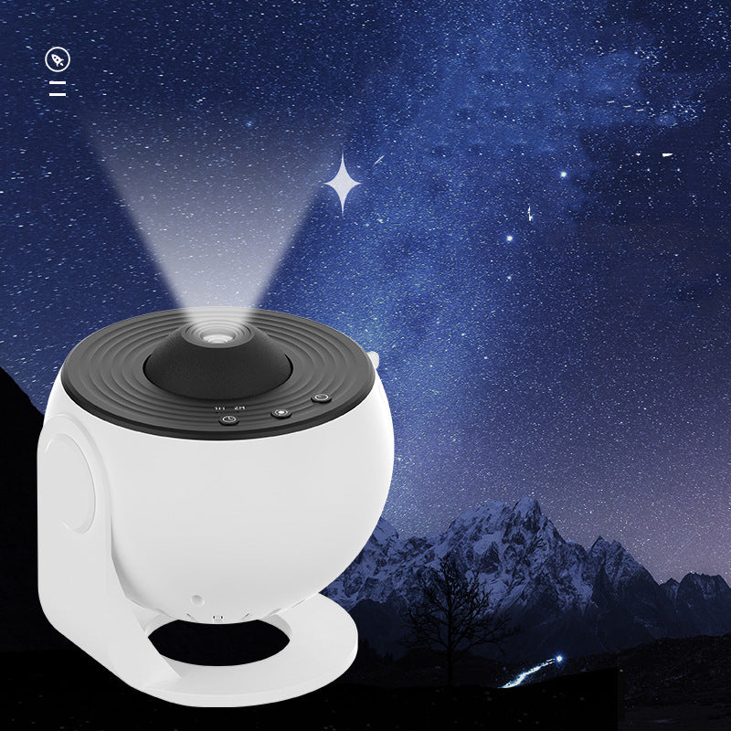 The projector casting a beam of starlight against a night sky over mountains
