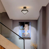 Interlocking ring ceiling light on a hallway ceiling