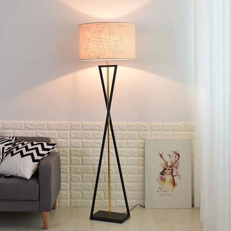 Drum shade floor lamp in a living room