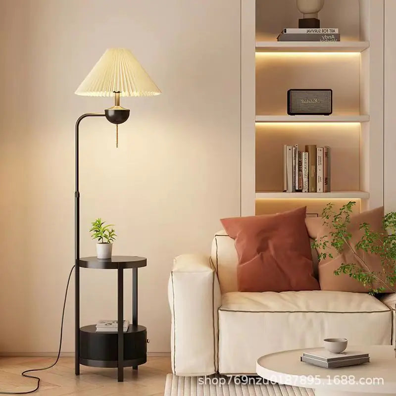 Floor lamp with side table beside a sofa