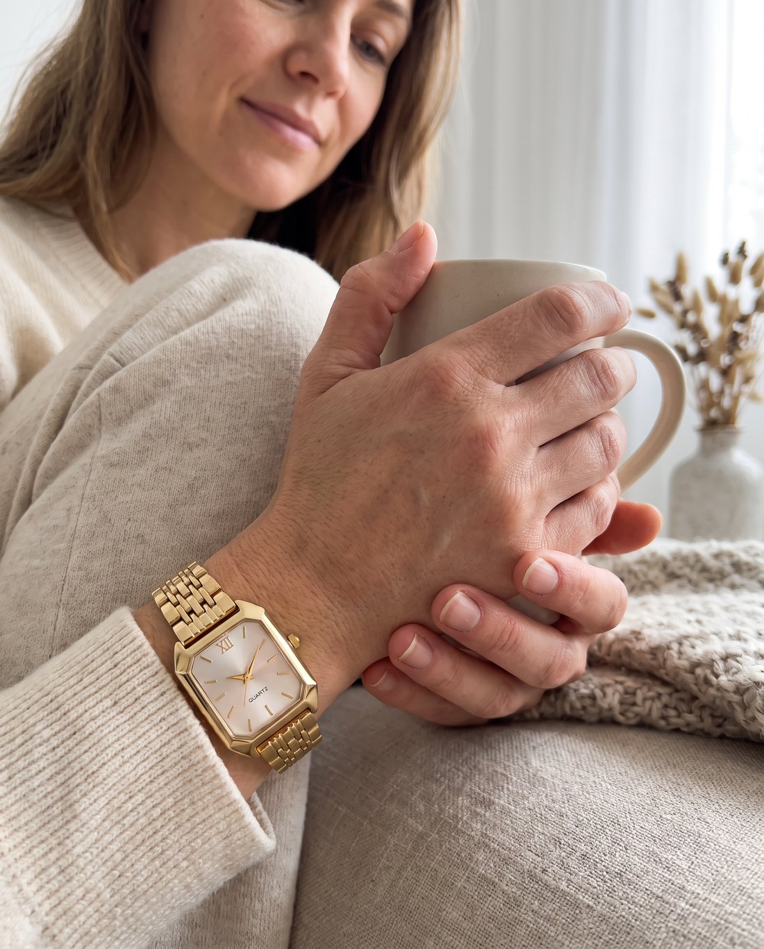 Wearing the Pearl Dial Watch with a mug
